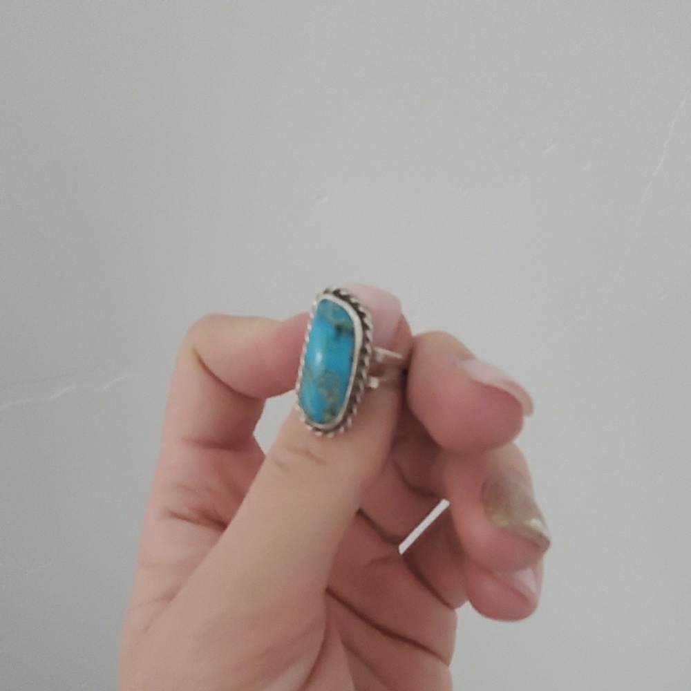 Turquoise ring.